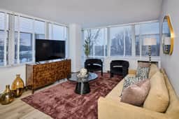 Modern 2BR w/ City View  *Fast Wi-Fi + Gym